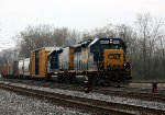 CSX 6954 leads D700 through the plant at Lamar